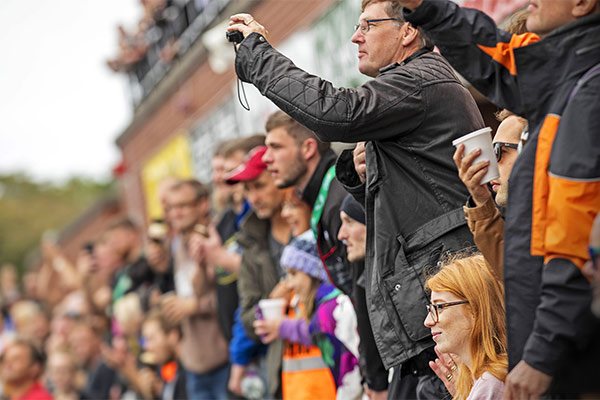 A crowd of people watching the Isle of Man TT