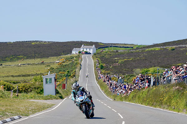 Michael Dunlop riding along the iconic Creg-ny-Baa during the TT Supersport race, Isle of Man