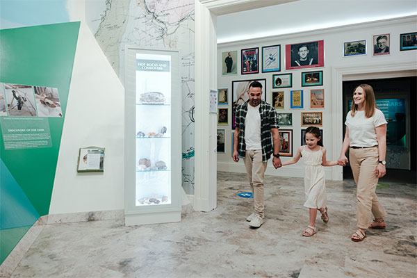 A family exploring the Manx Museum on the Isle of Man