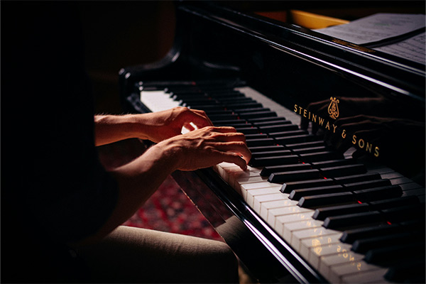 Someone playing the piano