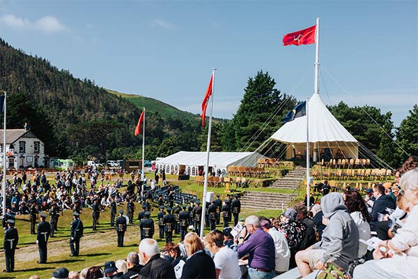 A crowd of people watching the procession at Tynwald Day on the Isle of Man