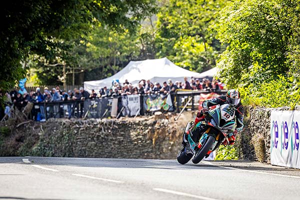 Peter Hickman leaning into a curve at Union Mills during the TT Superbike race